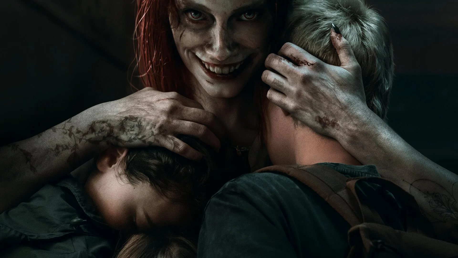 A woman possessed by a demon hugging two children