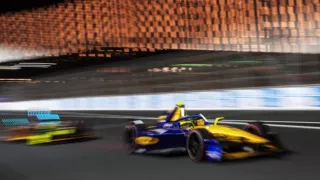 Formula E race car in action on a circuit, streaming with ESPN on Disney+.
