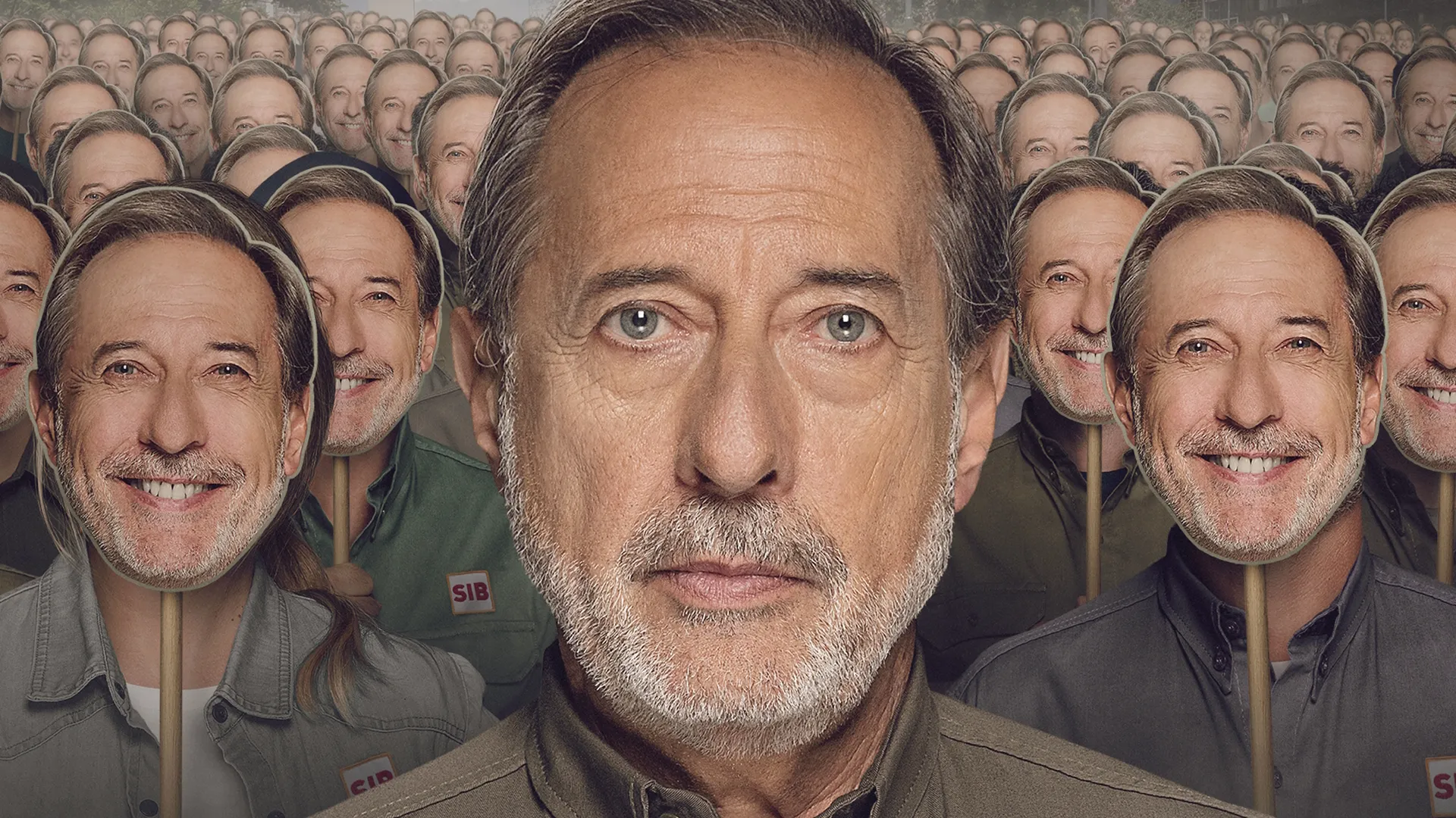 Eliseo (Guillermo Francella) stares, frowning, at the viewer, in front of a crowd of hundreds of people wearing masks of his smiling face.