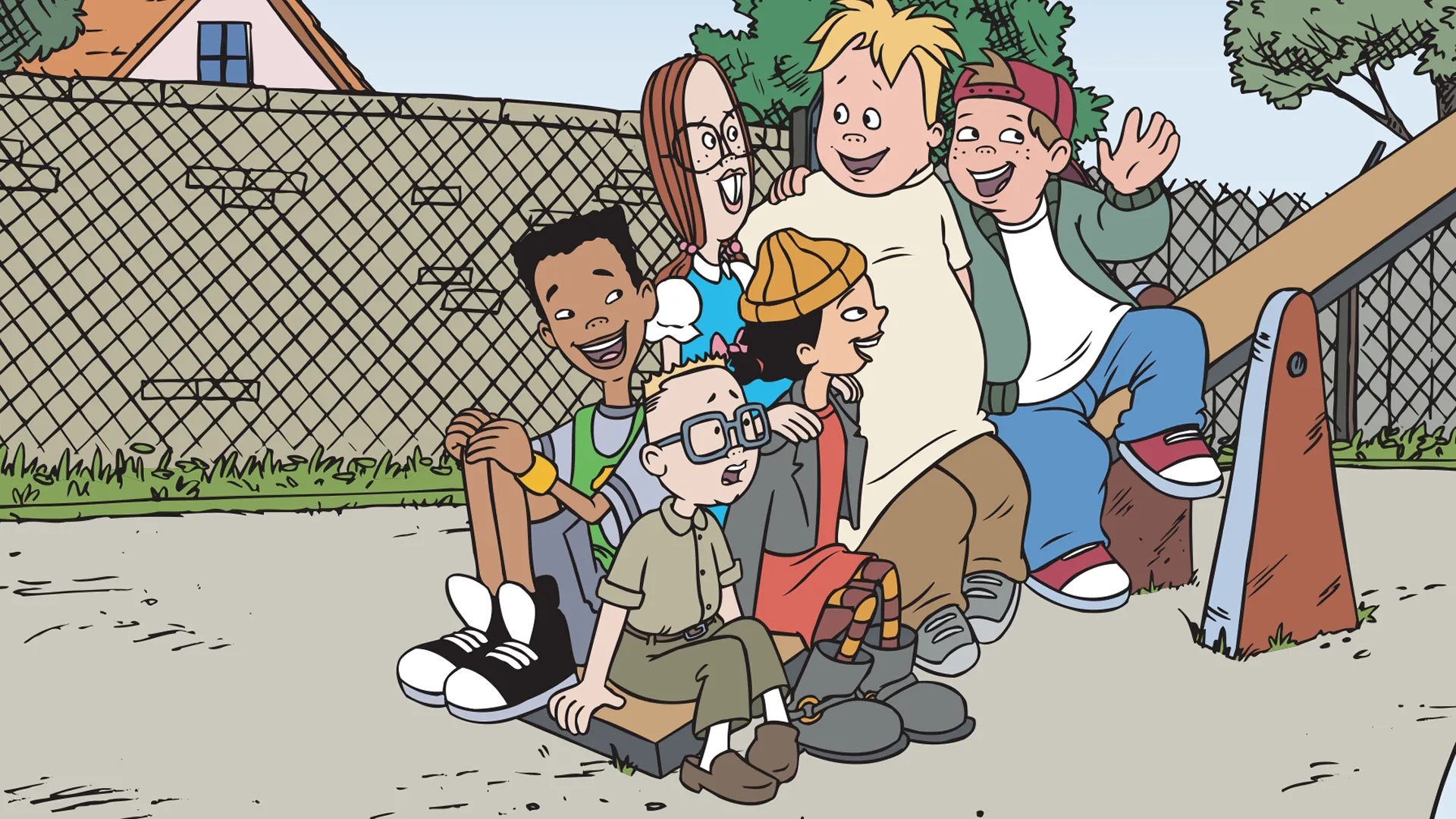 The six main characters from the Disney animated series Recess (Vince, Gus, Spinelli, Gretchen, Mikey, and T.J.) are gathered closely together on a school playground in front of a chain-link fence.