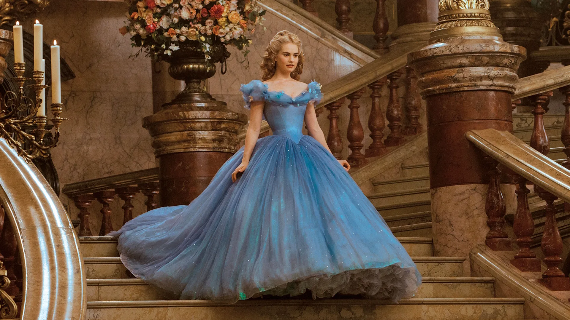 Lily James as Cinderella, in the iconic blue ballgown from Disney's 2015 live-action Cinderella