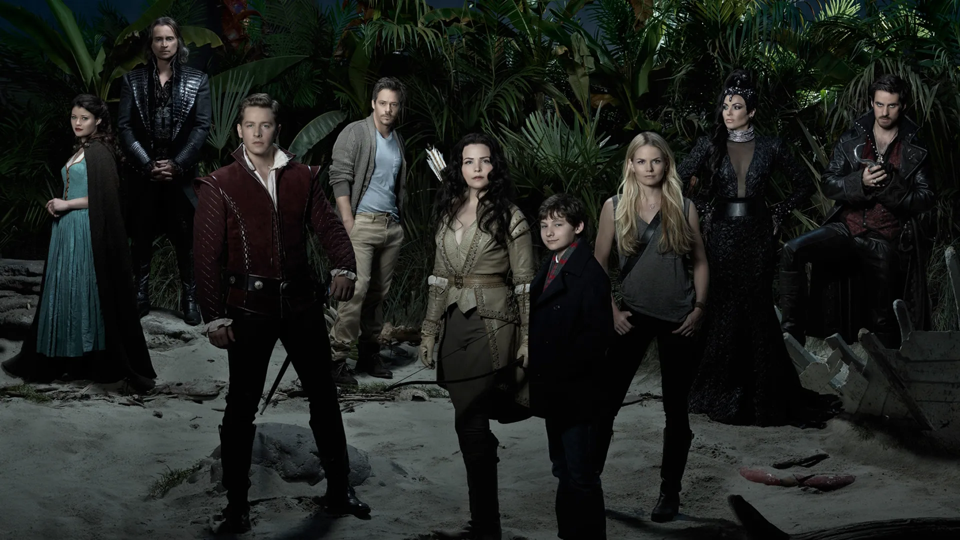 Cast of Once Upon a Time, including Belle (Emilie De Ravin), Rumplestiltskin (Robert Carlyle), Henry (Jared S. Gilmore), Emma Swan (Jennifer Morrison), Snow White (Ginnifer Goodwin), and Prince Charming (Josh Dallas), Regina (Lana Parilla), and Hook (Colin O'Donoghue).
