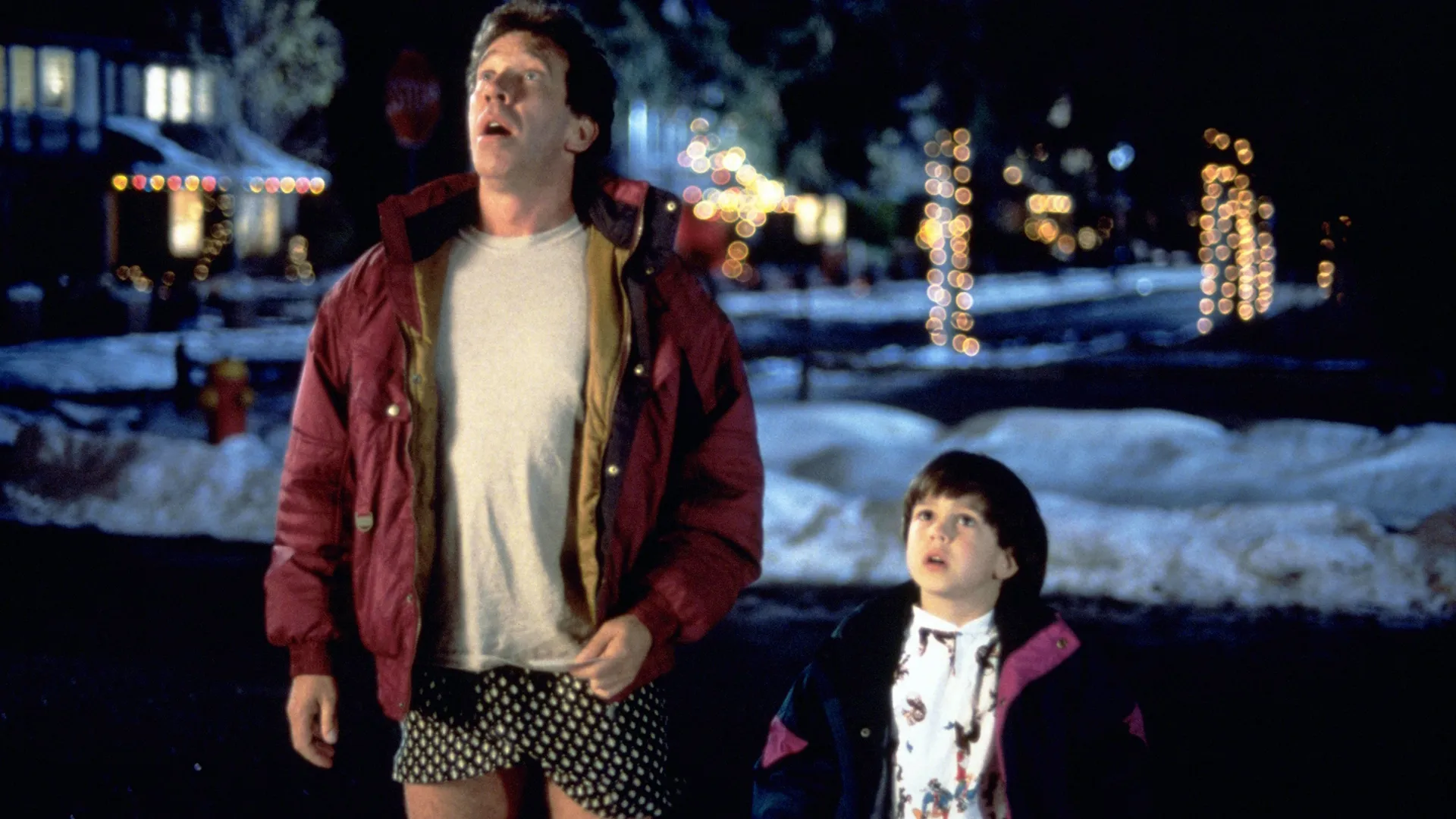 A scene from the 1994 film The Santa Clause, featuring actors Tim Allen and Eric Lloyd. 
