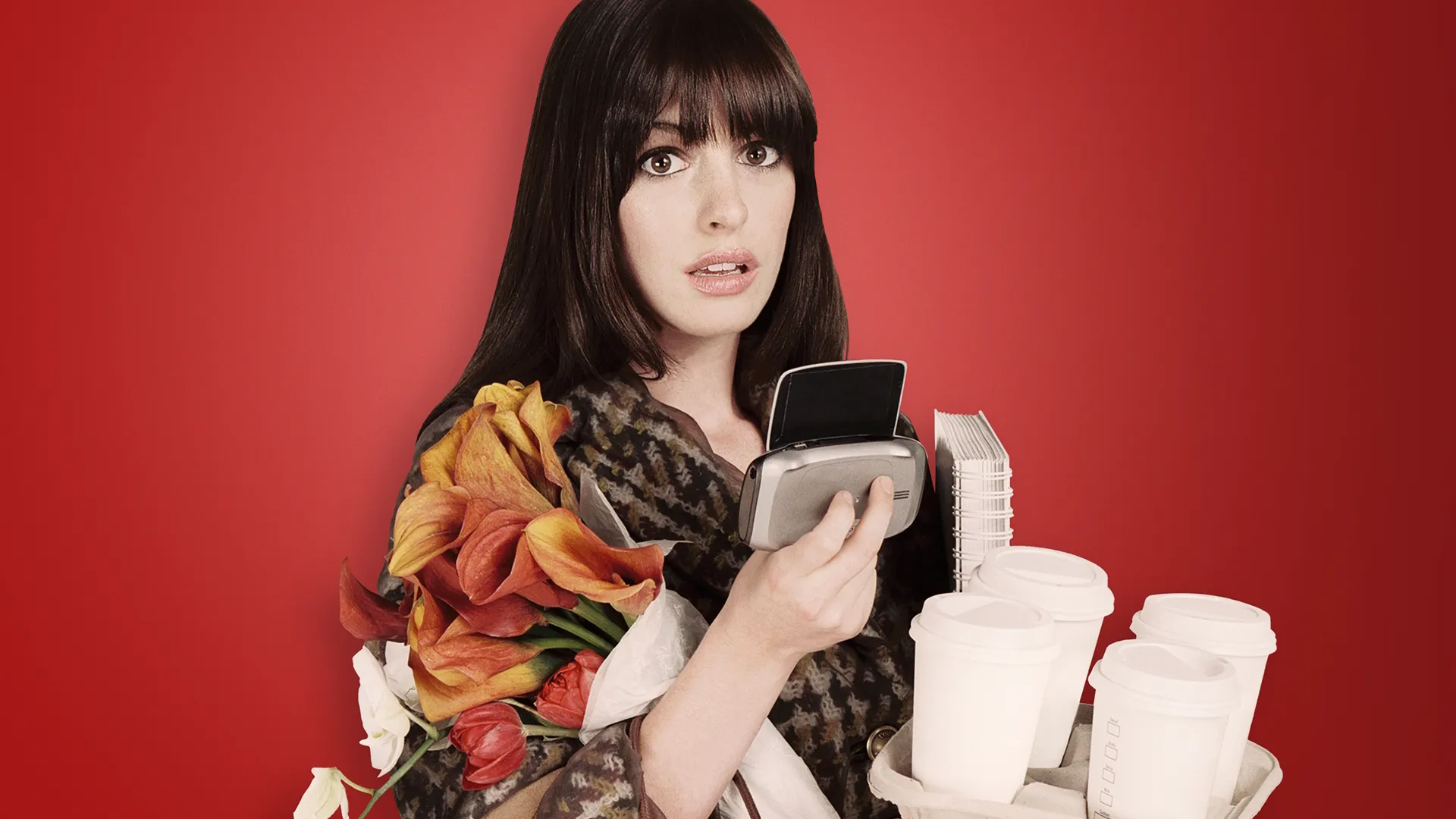 Anne Hathaway as Andy Sachs in The Devil Wears Prada.