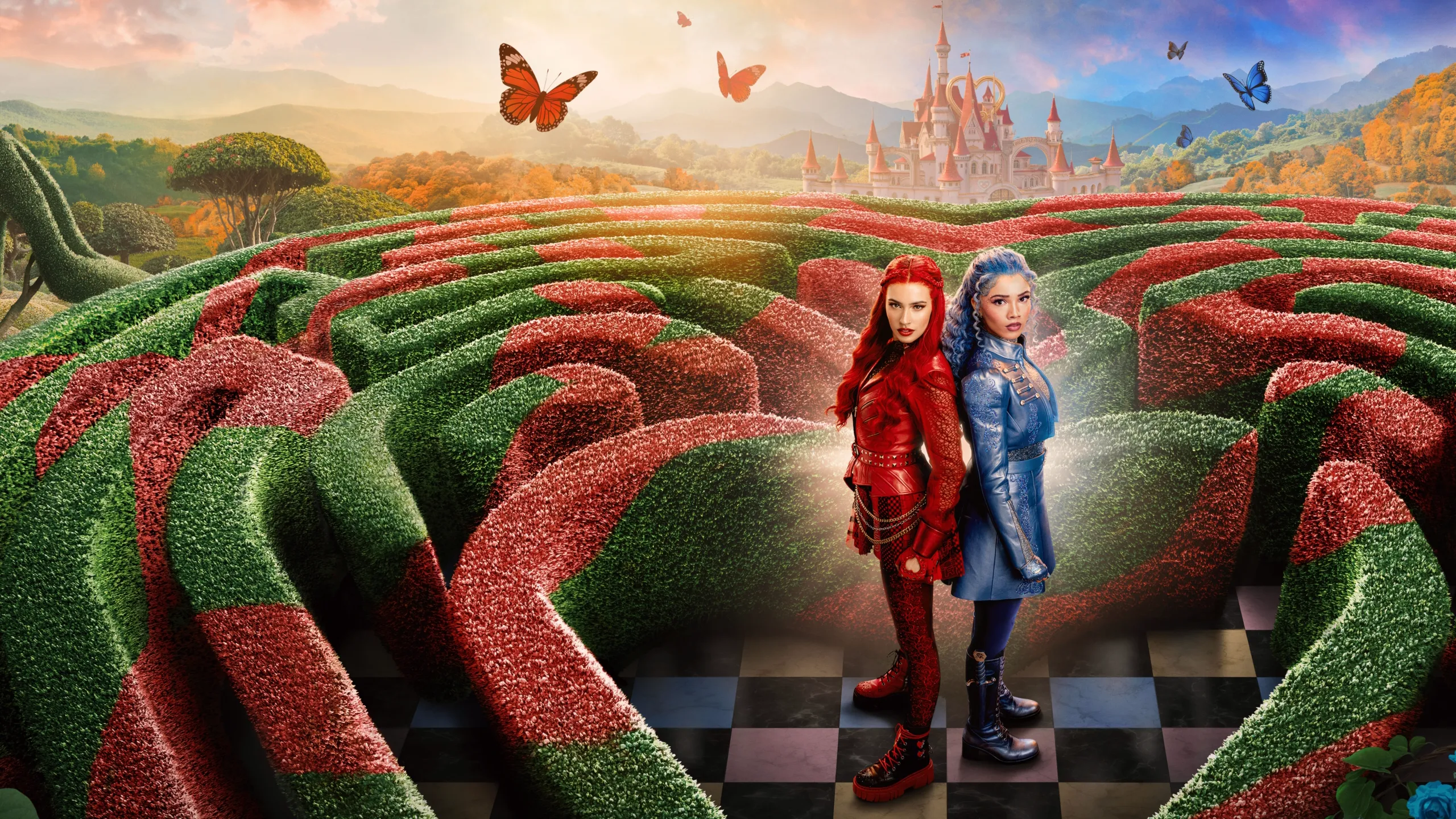  Red (played by Kylie Cantrall), the daughter of the Queen of Hearts, dressed in her signature red attire, and Chloe Charming (played by Malia Baker) in Descendants: Wicked Wonderland