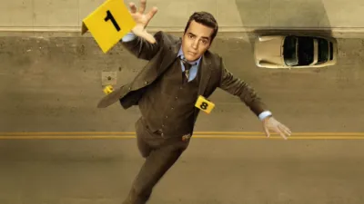 Will Trent (Ramón Rodríguez) falling while reaching for a yellow evidence marker.