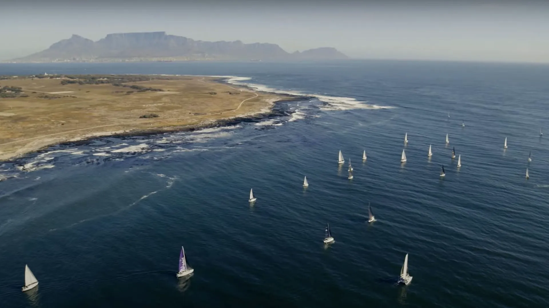 Wide shot of numerous yachts from the Round Robben Island yacht race from The Academy short.
