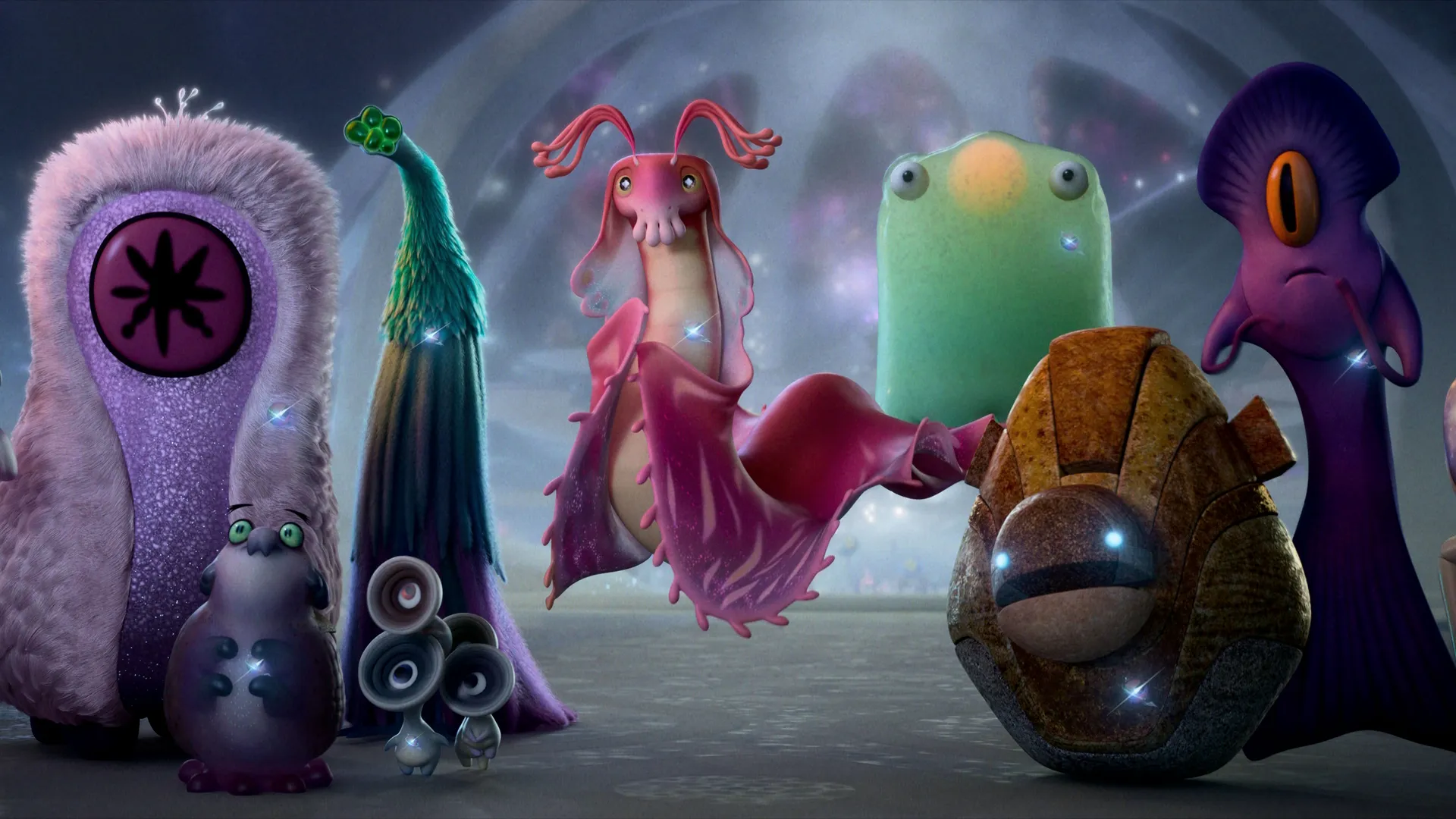 Ambassador Questa (voiced by Jameela Jamil), along with other extraterrestrials at the Communiverse. 