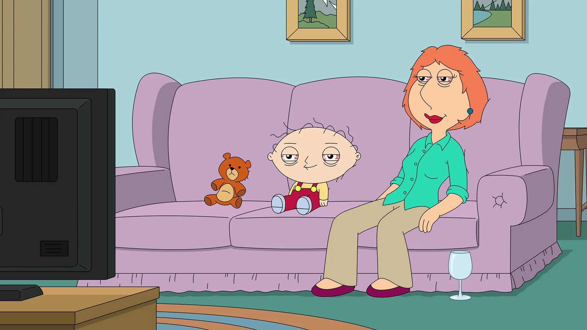 A disheveled Stewie and Lois sit on the sofa watching TV