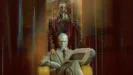 An official promotional poster for Marvel Television's VisionQuest shows Vision sitting in a yellow armchair reading a newspaper, while James Spader's human-form Ultron stands directly behind him with a hand on his shoulder against a wood-paneled room distorted by glitch effects.