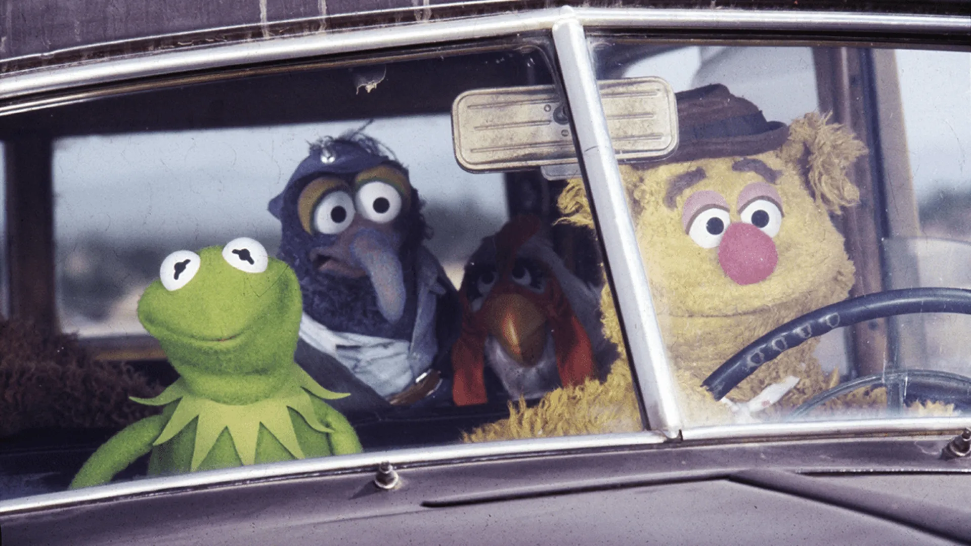 The Muppets Movie | Kermit and other muppets in a car.