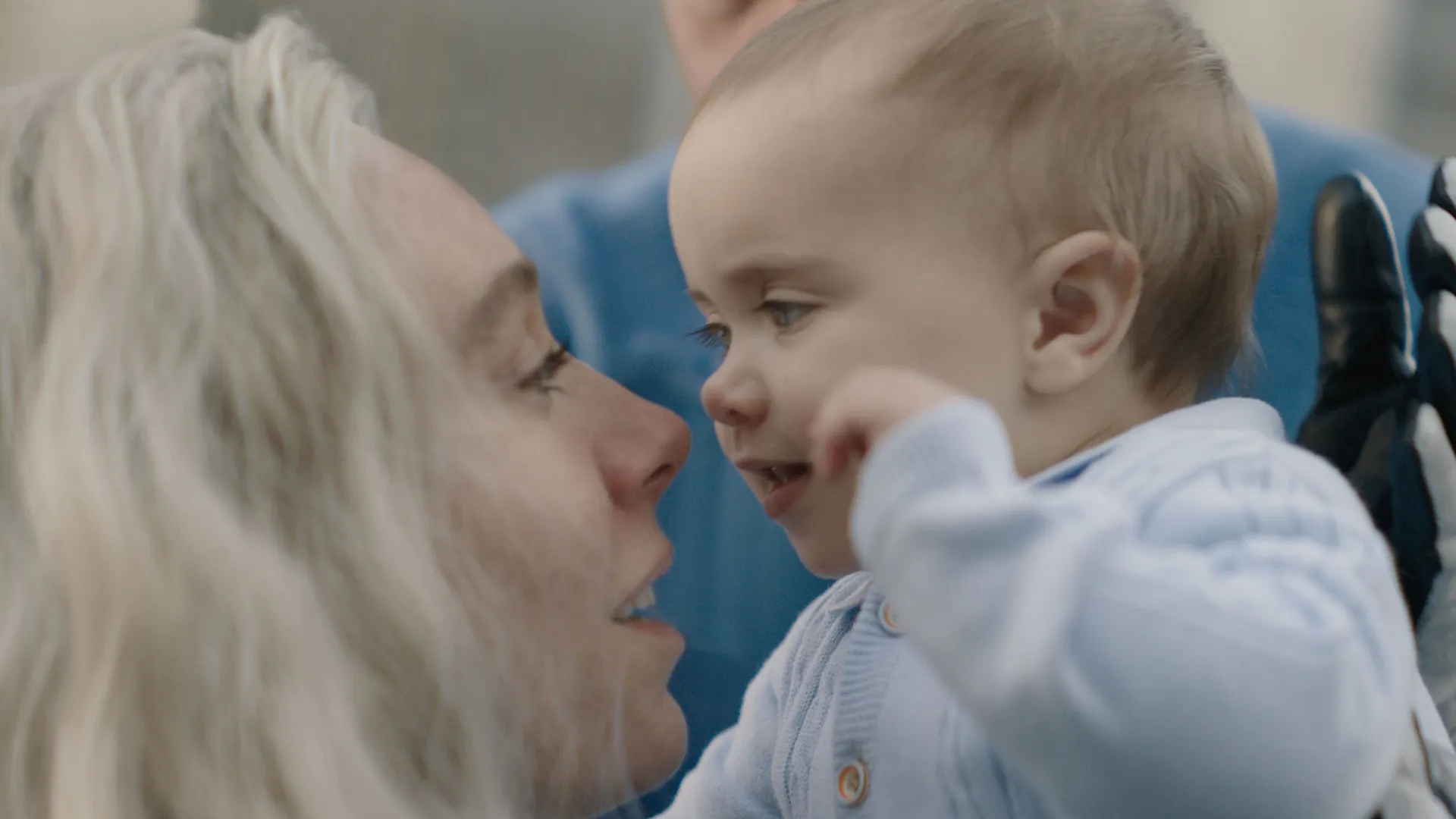 This image features Vanessa Kirby playing Sue Storm and a baby acting as Franklin Richards in the 2025 film The Fantastic Four: First Steps. 