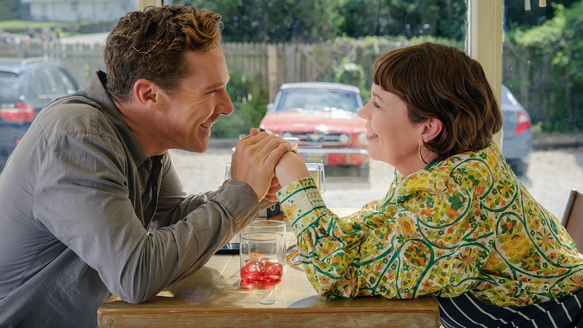 Benedict Cumberbatch and Olivia Colman in a scene from The Roses, Disney+, Hulu*