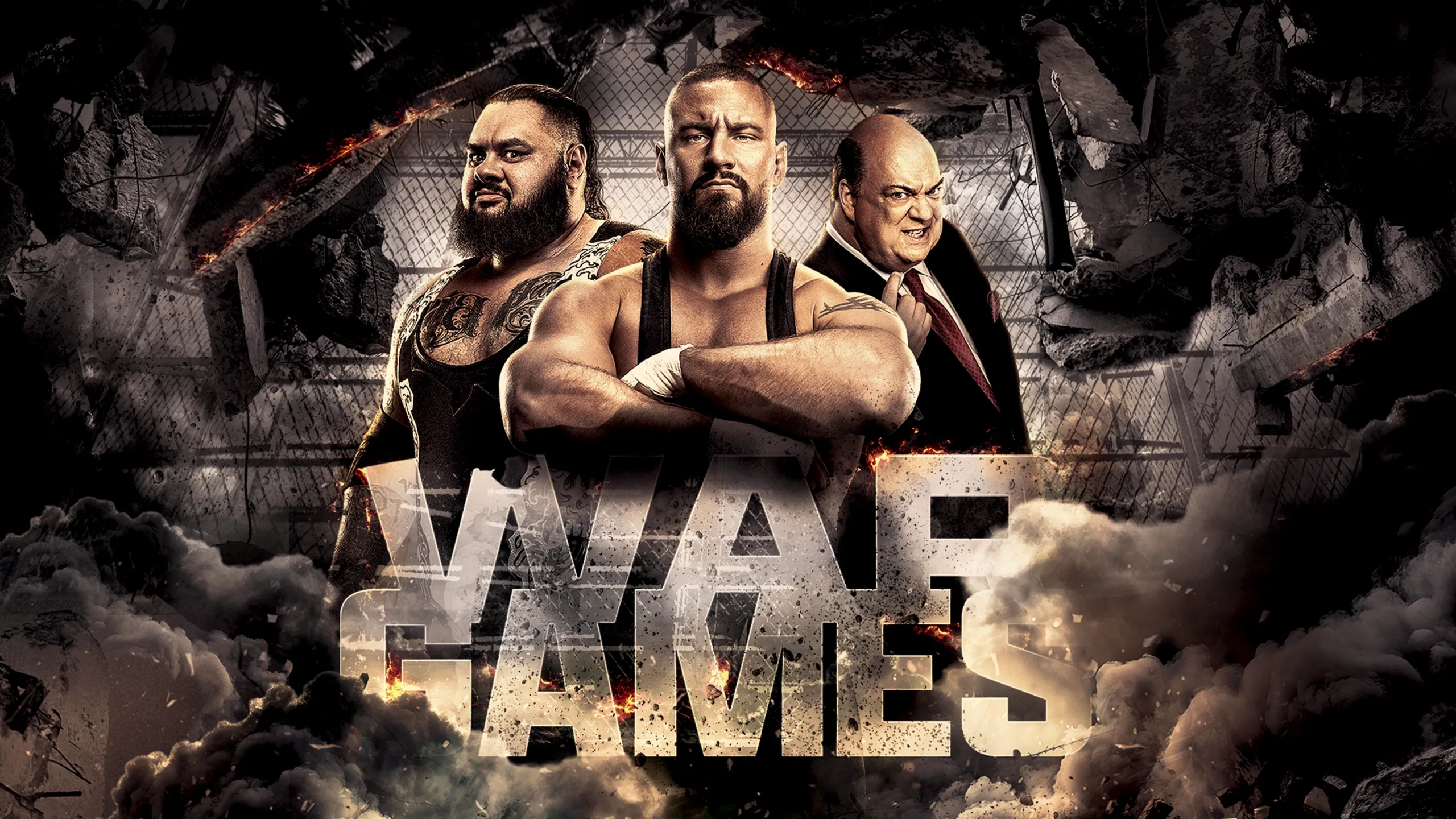 Wrestlers Bronson Reed and Bron Breakker, and Manager Paul Heyman pose behind a large WarGames logo, surrounded by debris and dust clouds.