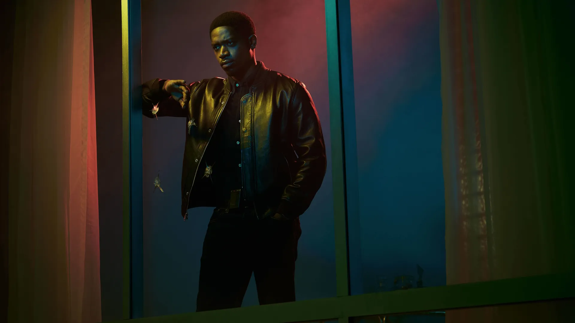 This image shows British actor Damson Idris in character as Franklin Saint from the FX drama series Snowfall
