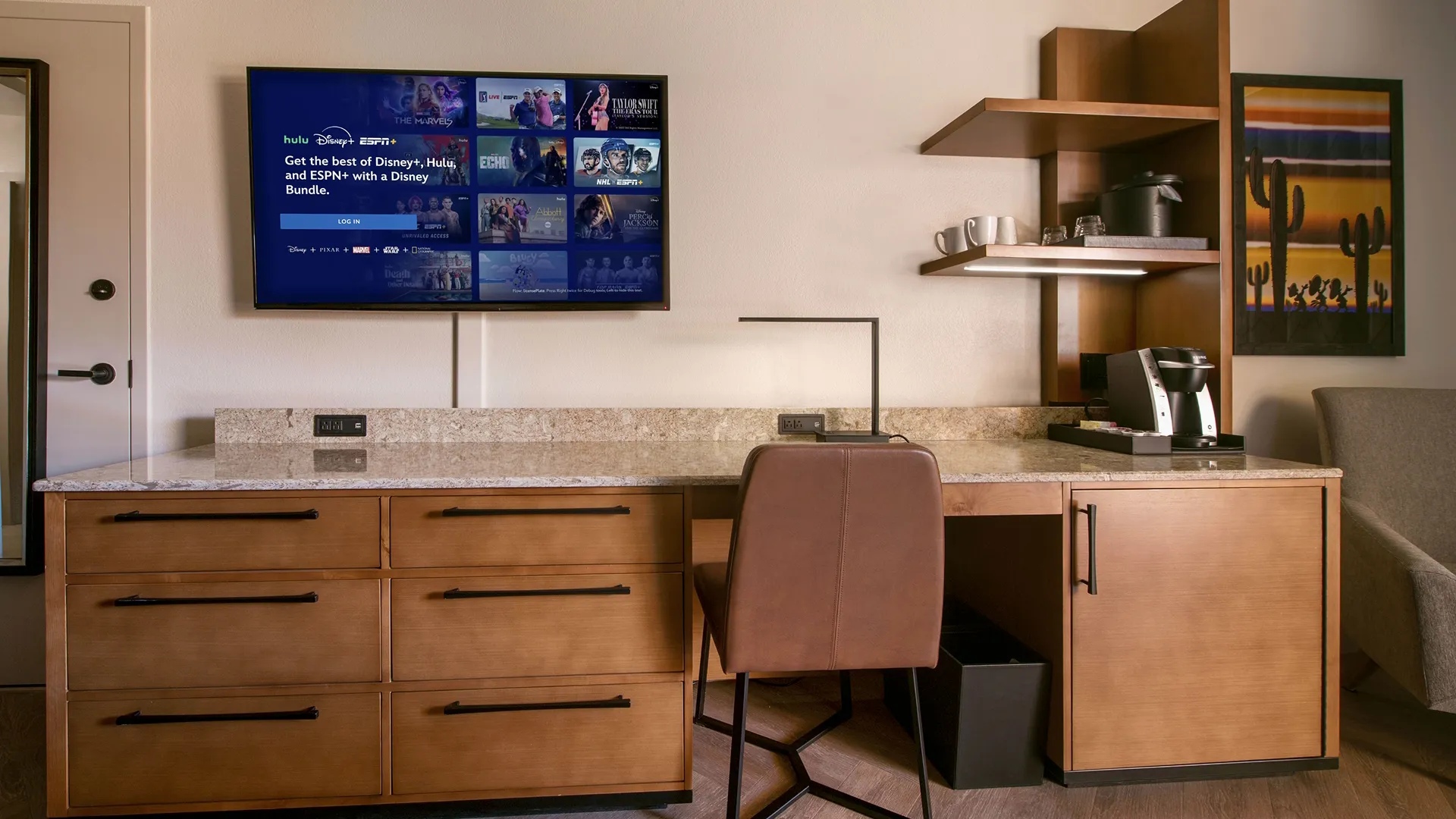 A hotel room with Disney+ on the TV