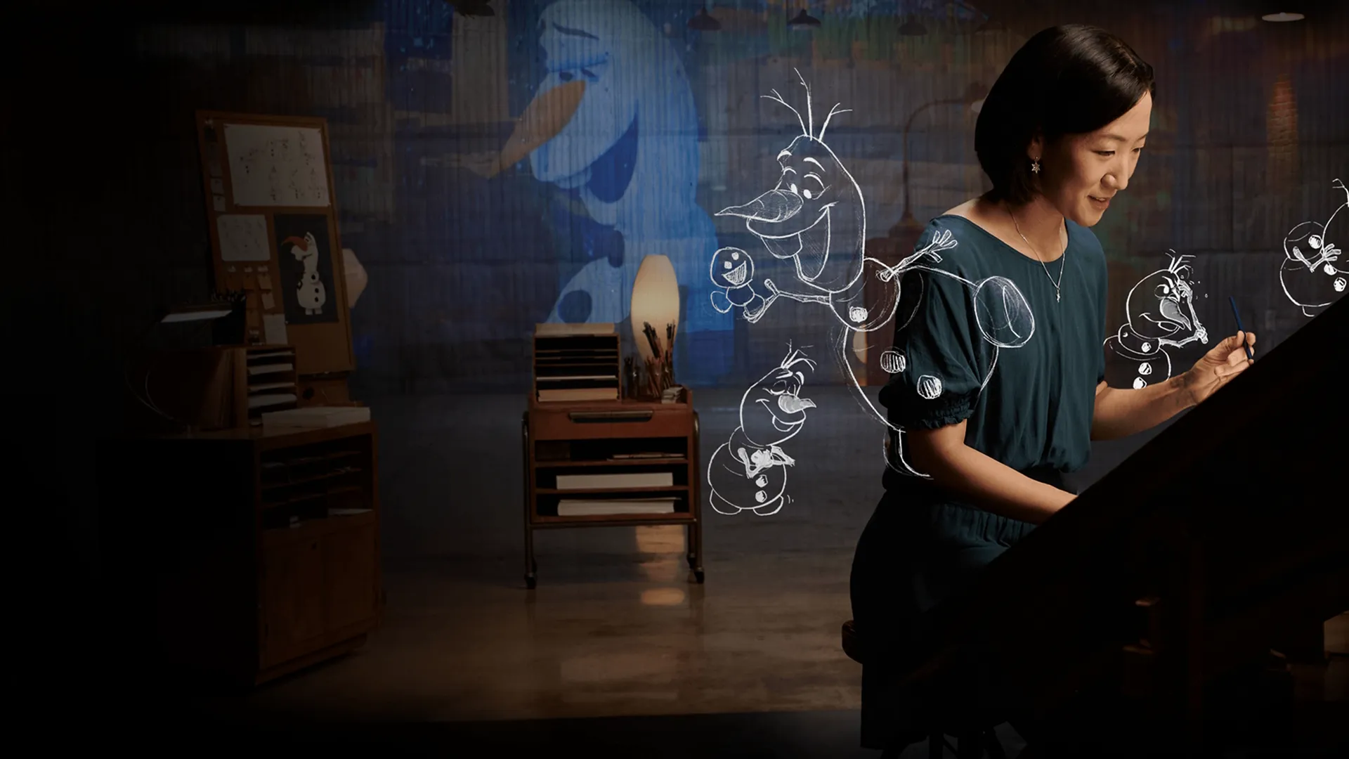 A woman working on a drawing board in Disney's Sketchbook 