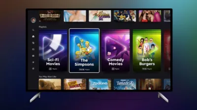 Disney+ home screen on a TV showing a Playlists row with Sci-Fi Movies, The Simpsons, Comedy Movies and Bob’s Burgers playlist tiles.