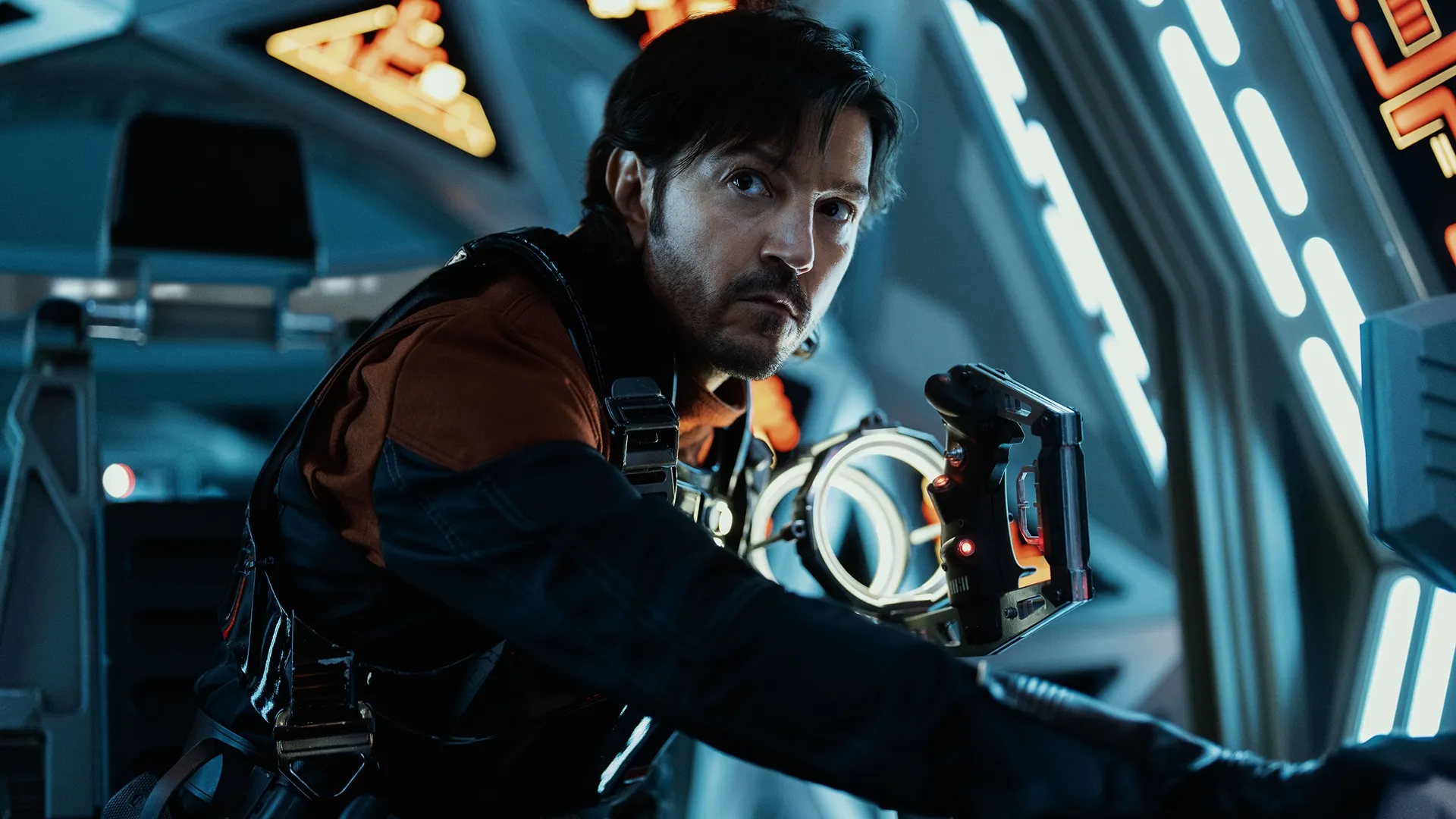 Cassian Andor (Diego Luna) in an imperial flight suit as he prepares to steal the TIE Avenger.