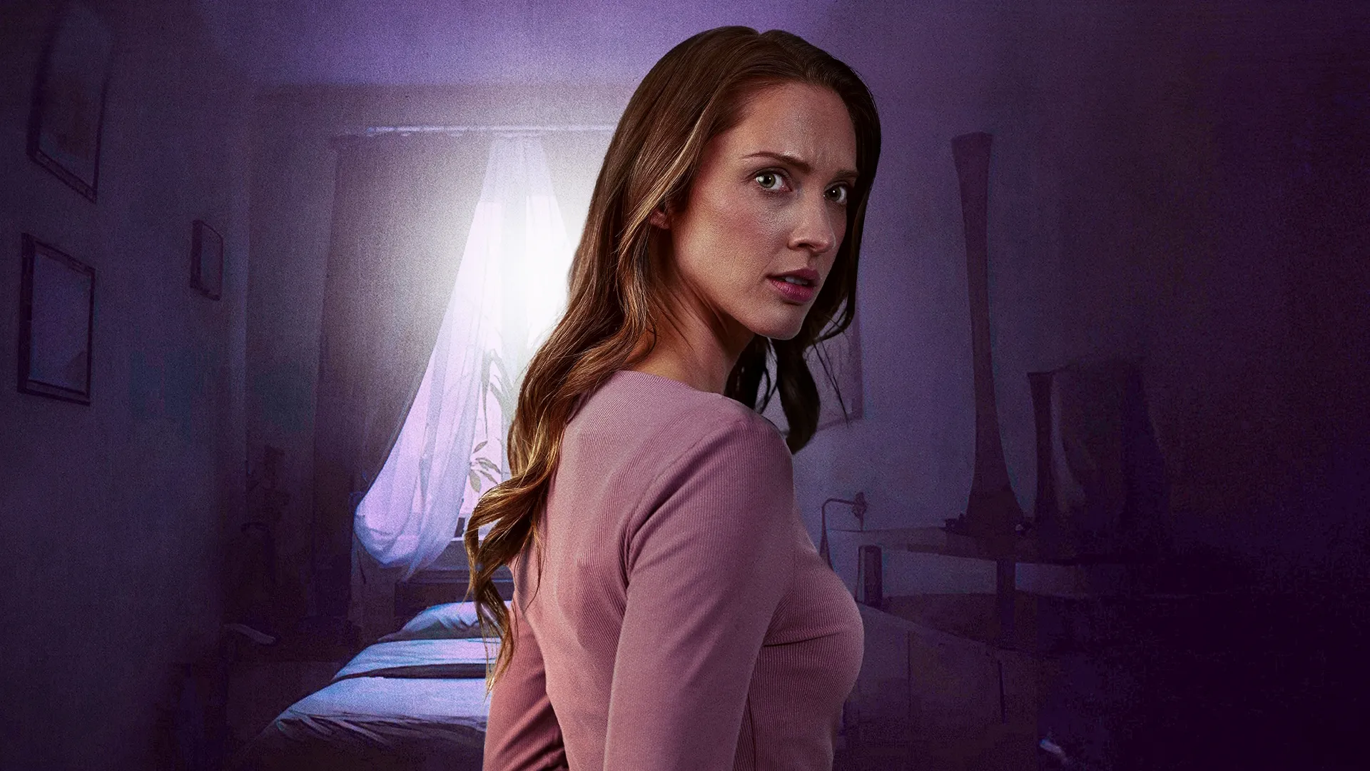 This image is a promotional still of actress Ciara Hanna from the thriller Trapped in Her Dorm Room. 