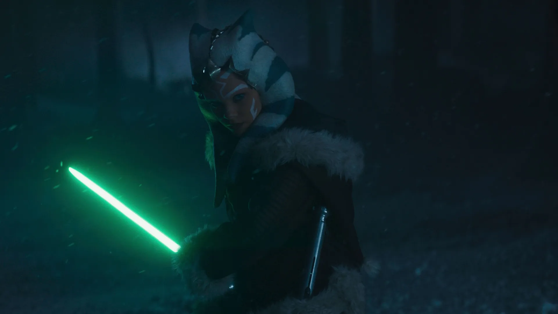 Ahsoka Tano (voiced by Rosario Dawson) wielding a green lightsaber