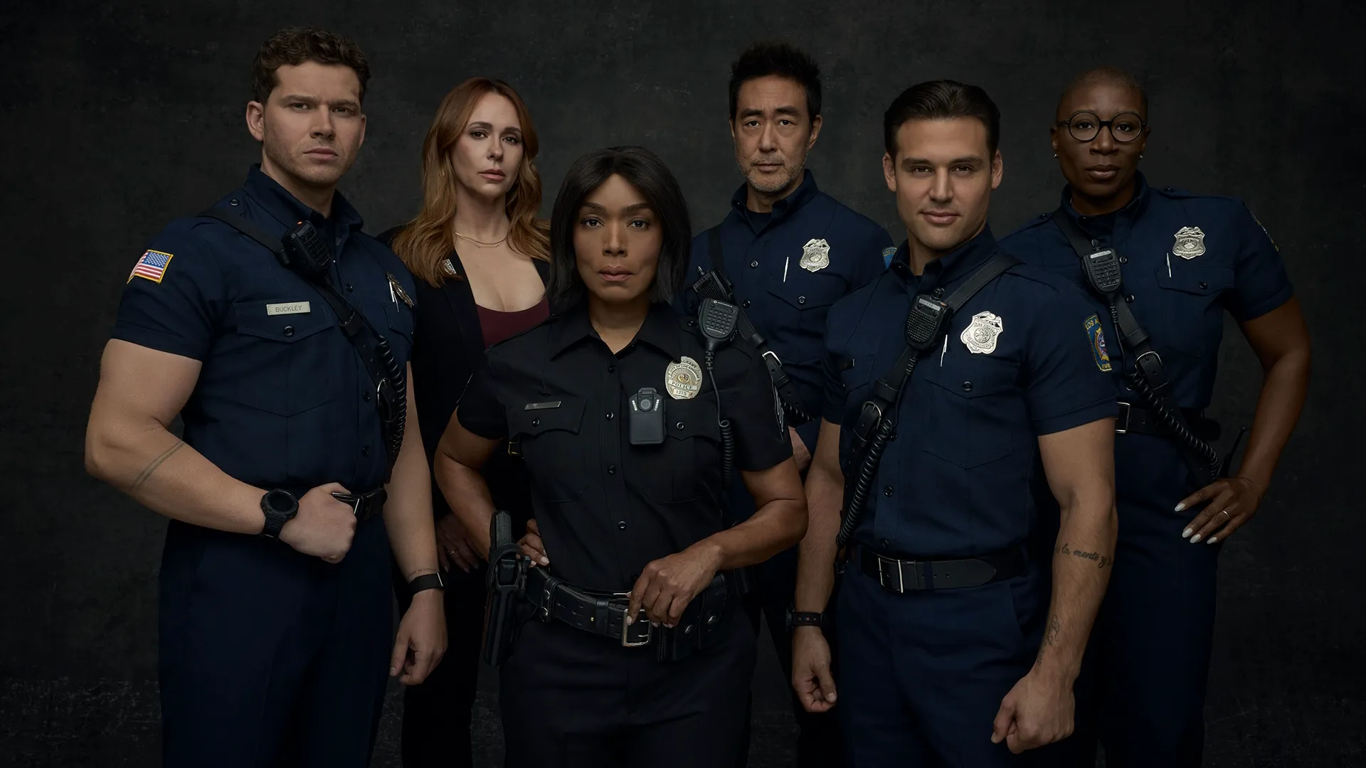 The cast of 9-1-1 including Athena Grant (Angela Bassett), Maddie Han (Jennifer Love Hewitt), Evan Buckley (Oliver Stark), Howard Han (Kenneth Choi), Eddie Diaz (Ryan Guzman) and Henrietta Wilson (Aisha Hinds).