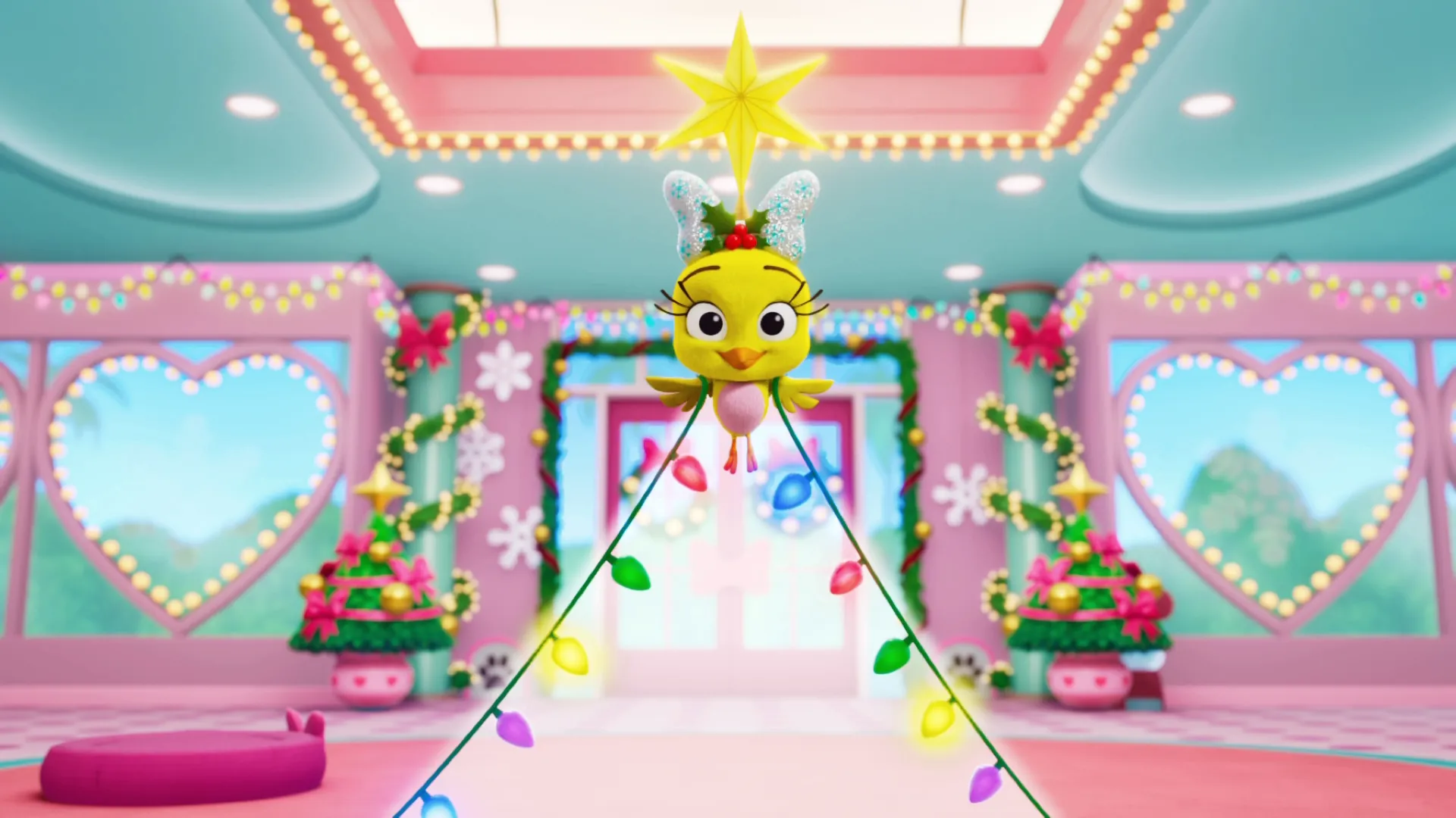 Cuckoo-Loca with Christmas lights hanging from her wings and a star resting on her head