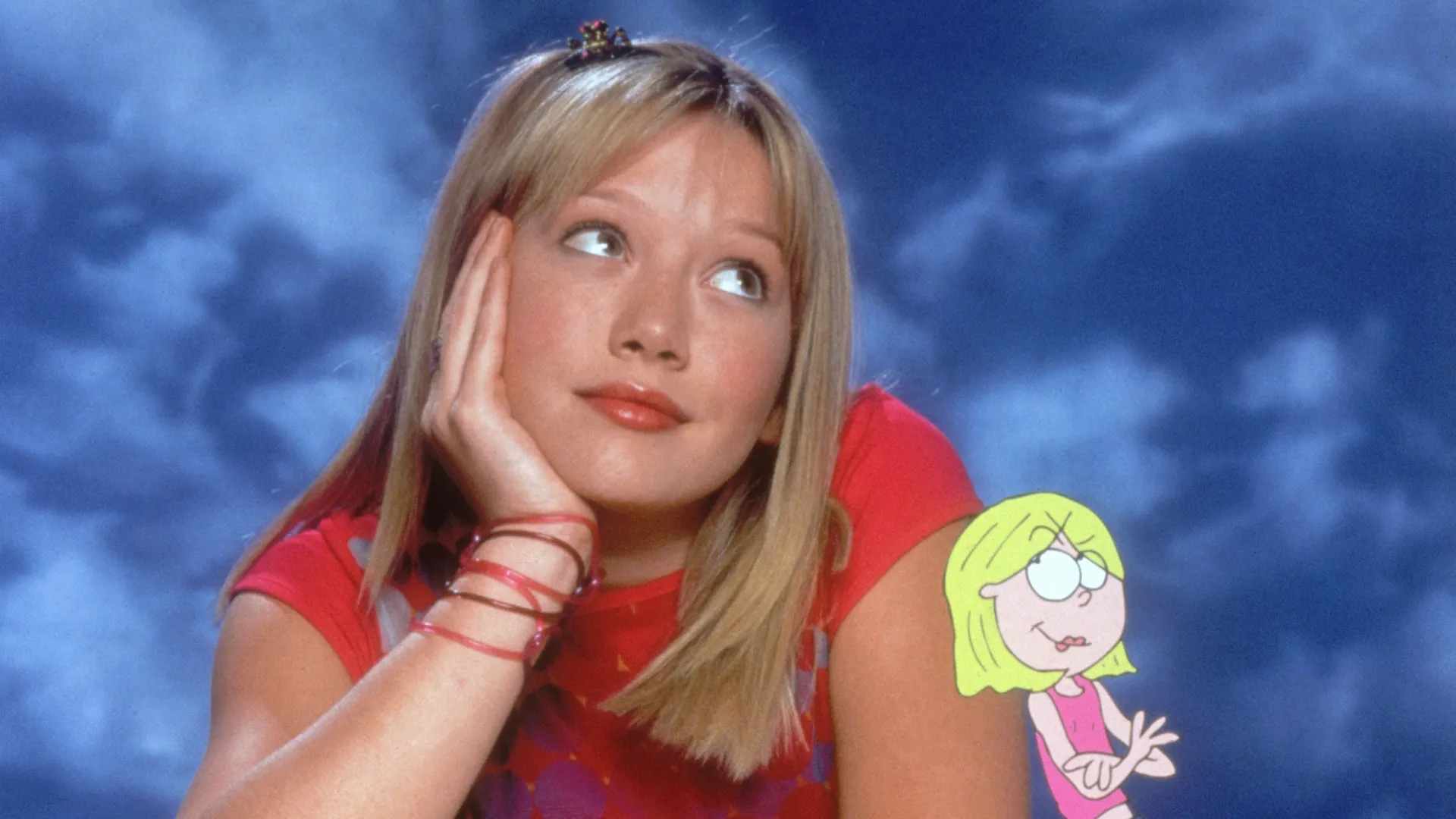 Key art for Lizzie McGuire featuring the titular character (played by Hilary Duff) and her animated counterpart.