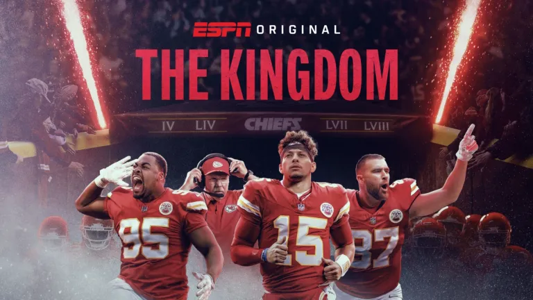 Chris Jones, head coach Andy Reid, Patrick Mahomes, and Travis Kelce running out of the tunnel in front of a crowd.