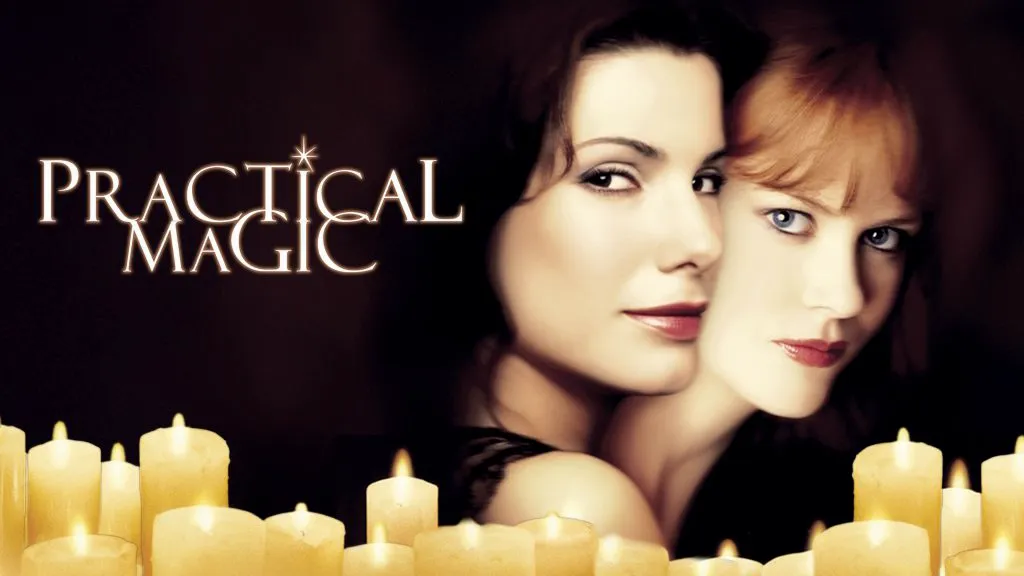 Title art for Practical Magic featuring Sandra Bullock and Nicole Kidman surrounded by glowing candles against a dark background.