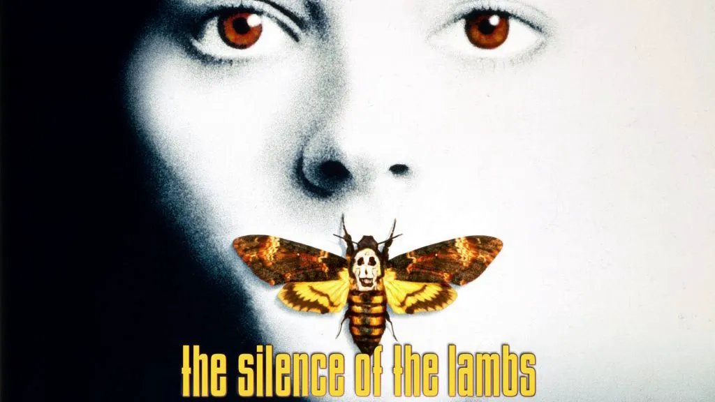 Jodie Foster as Clarice Starling in The Silence of the Lambs, with a death’s-head moth covering her mouth on the film’s iconic poster.