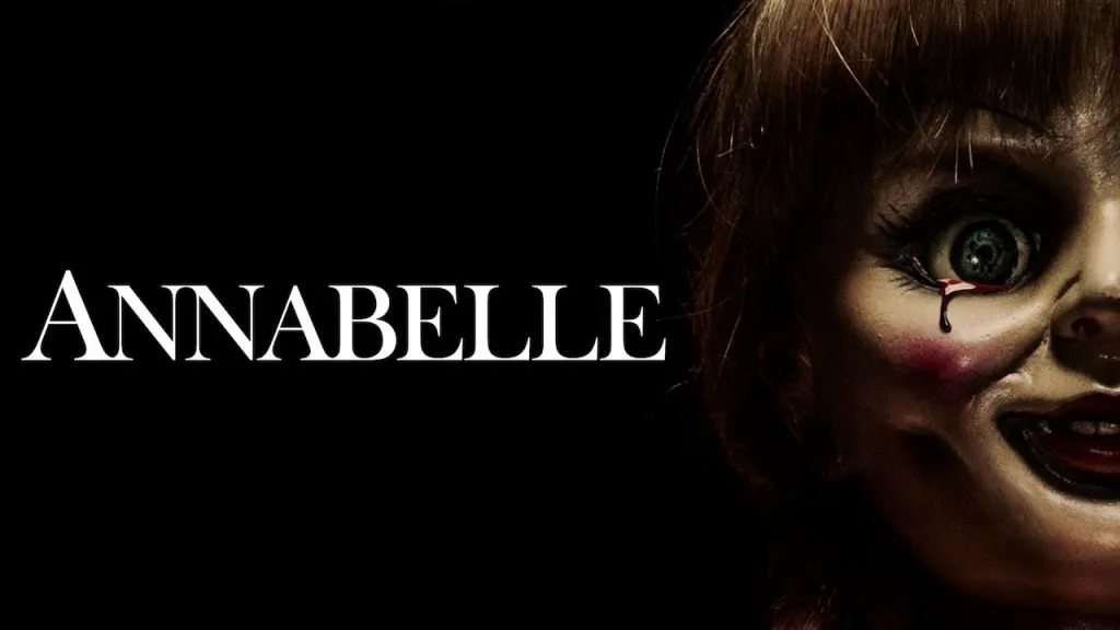 Poster for Annabelle showing a close-up of the eerie porcelain doll’s cracked face.