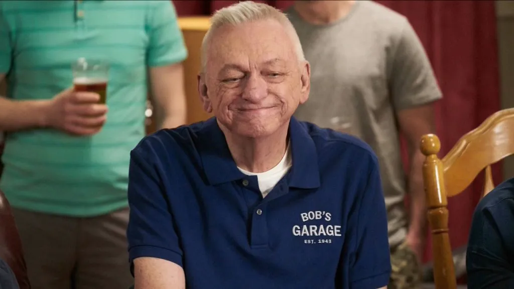 A still image of John Hemphill as Bob Currie in an episode of Schitt’s Creek.