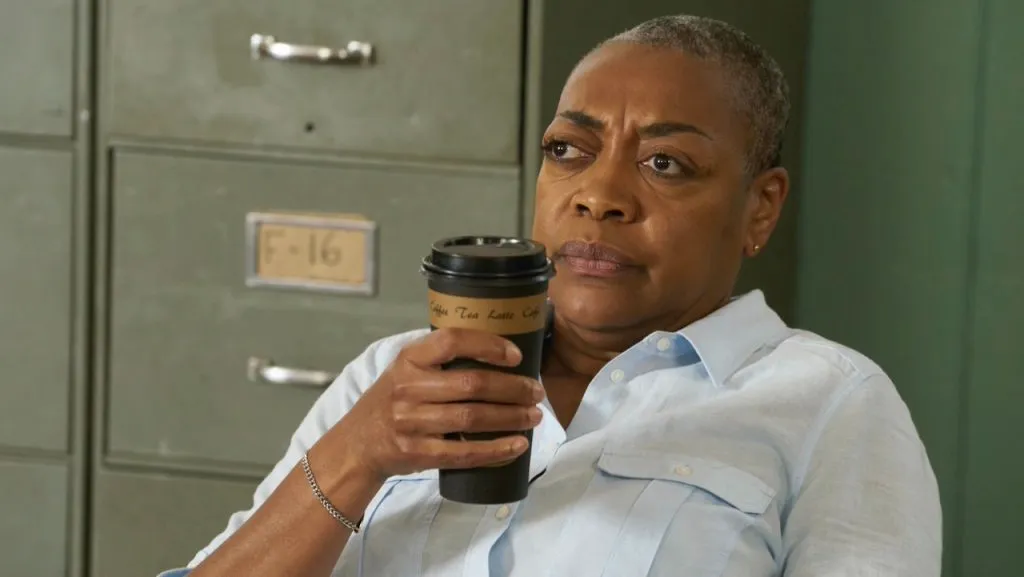 A still image of Karen Robinson as Ronnie Lee in an episode of Schitt’s Creek.