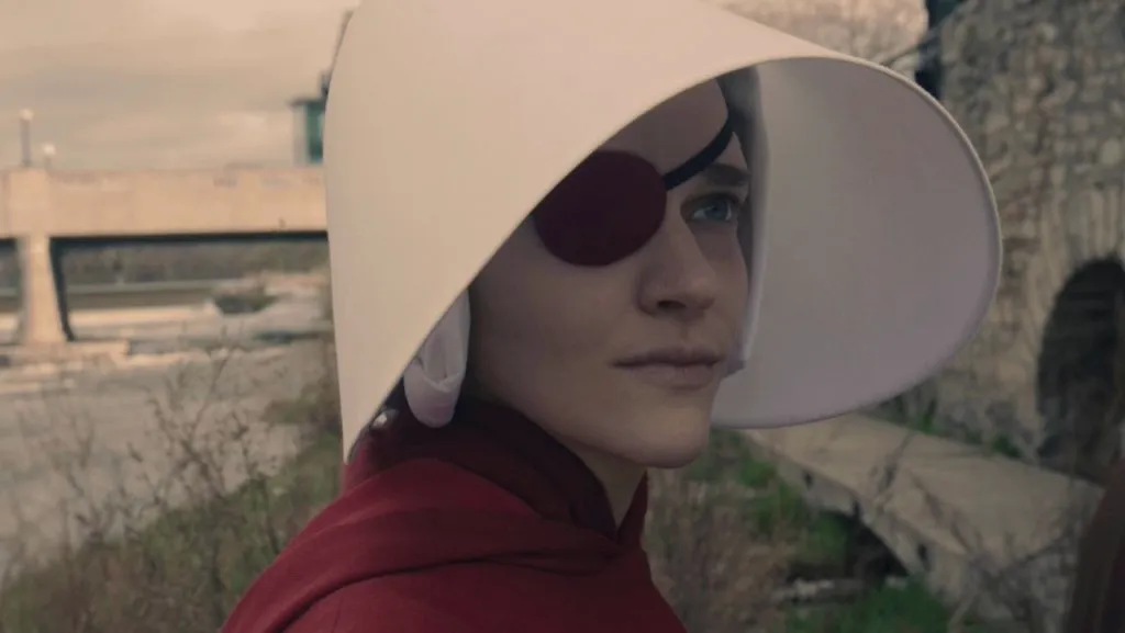A still image of Madeline Brewer as Janine Lindo in The Handmaid’s Tale.