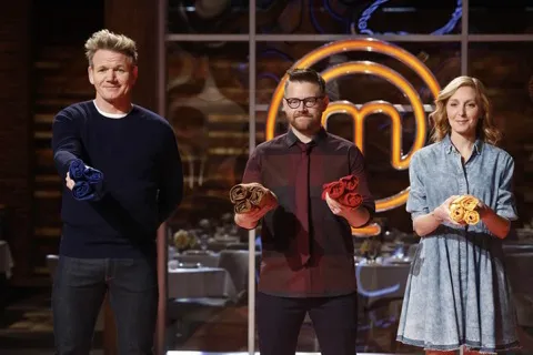 Title art for MasterChef Jr. featuring judges handing out team aprons