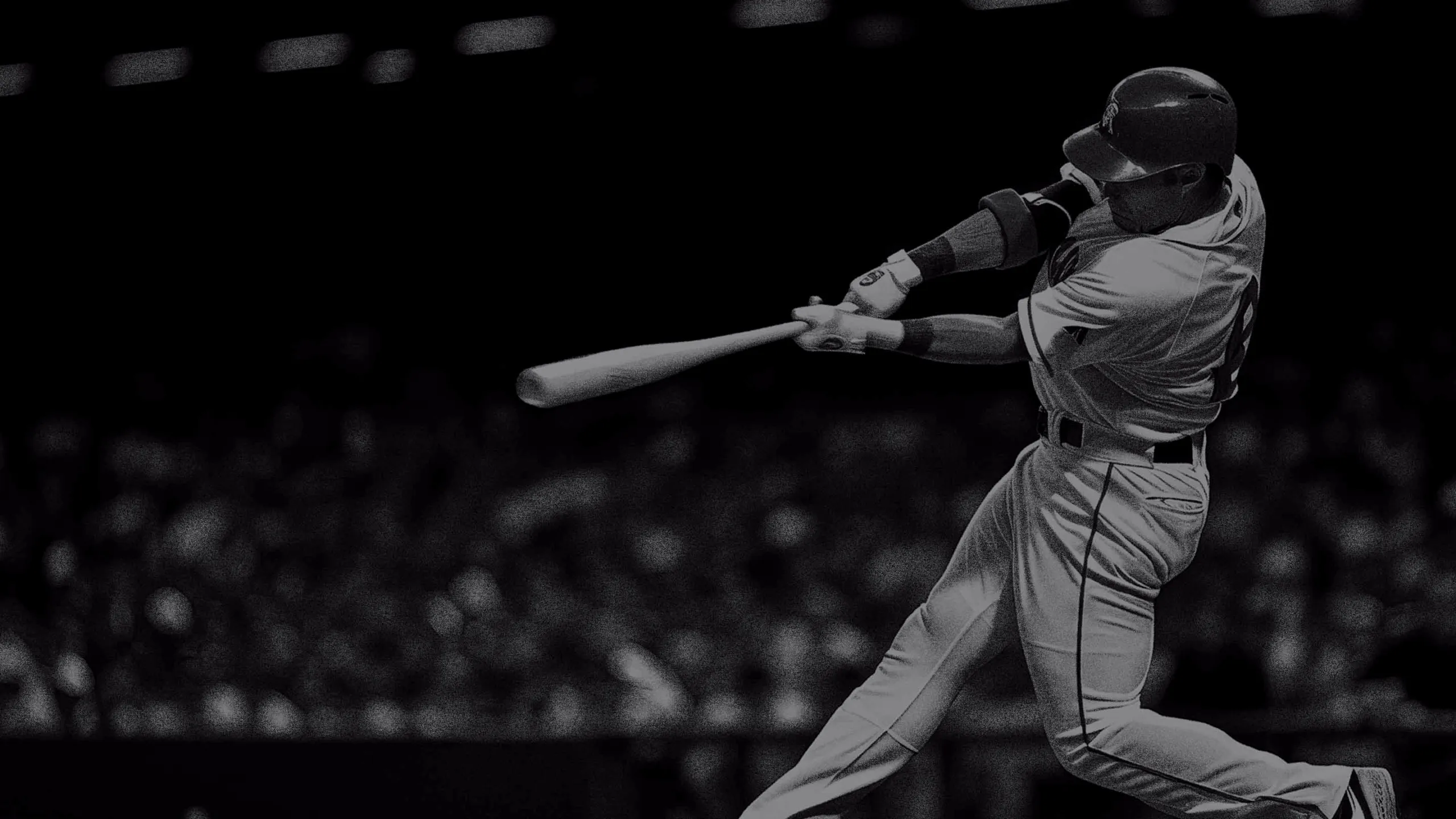 Baseball player hitting with the baseball bat