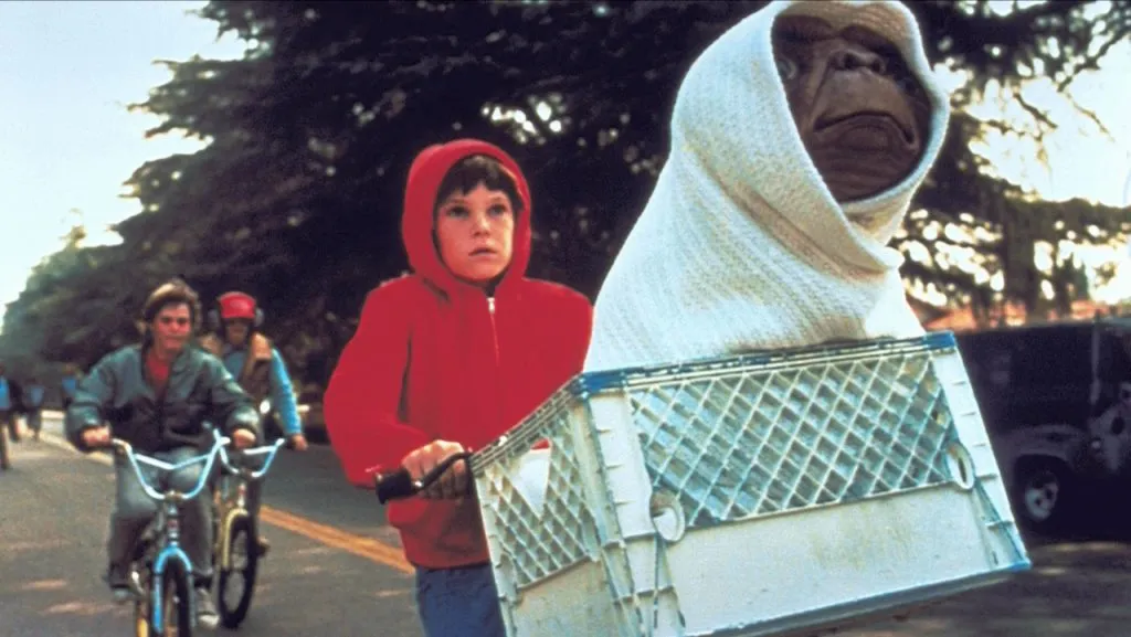 A still image from the Steven Spielberg movie, E.T. the Extraterrestrial, one of the ’80s best movies.