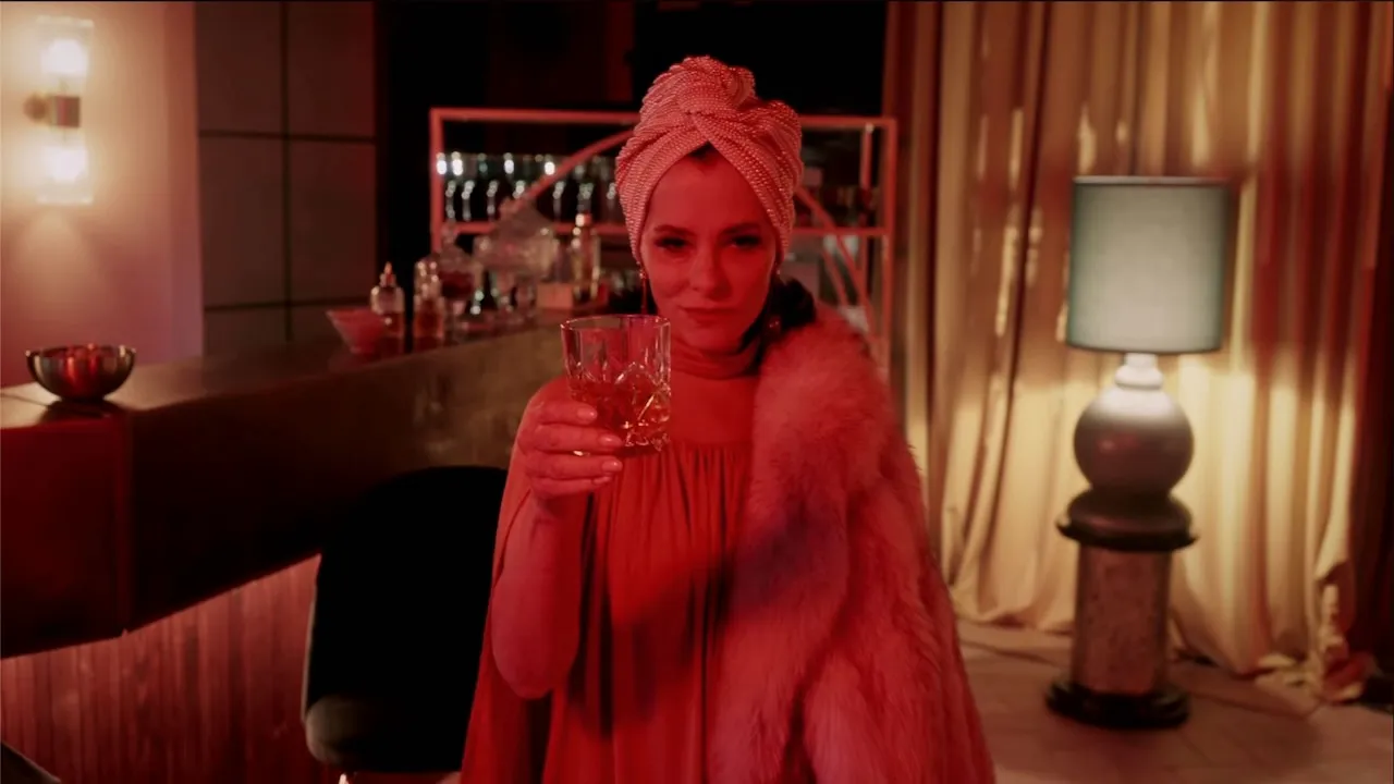 Parker Posey serves as the host and ring leader of The Mob.