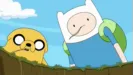 Finn the Human and Jake the Dog from Adventure Time look down into a grassy pit in the Land of Ooo.