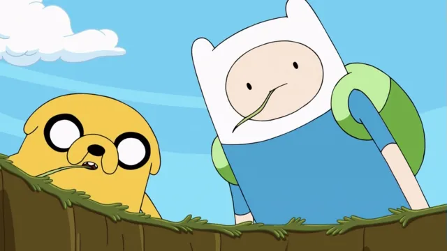 Finn the Human and Jake the Dog from Adventure Time look down into a grassy pit in the Land of Ooo.
