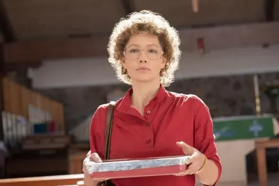 Still photo from Hulu Original Series Candy holding a dish