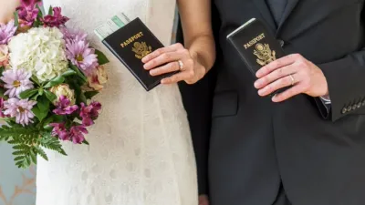 Newlywed couple holding U.S. passports and wedding bouquet on 90 Day Fiancé.