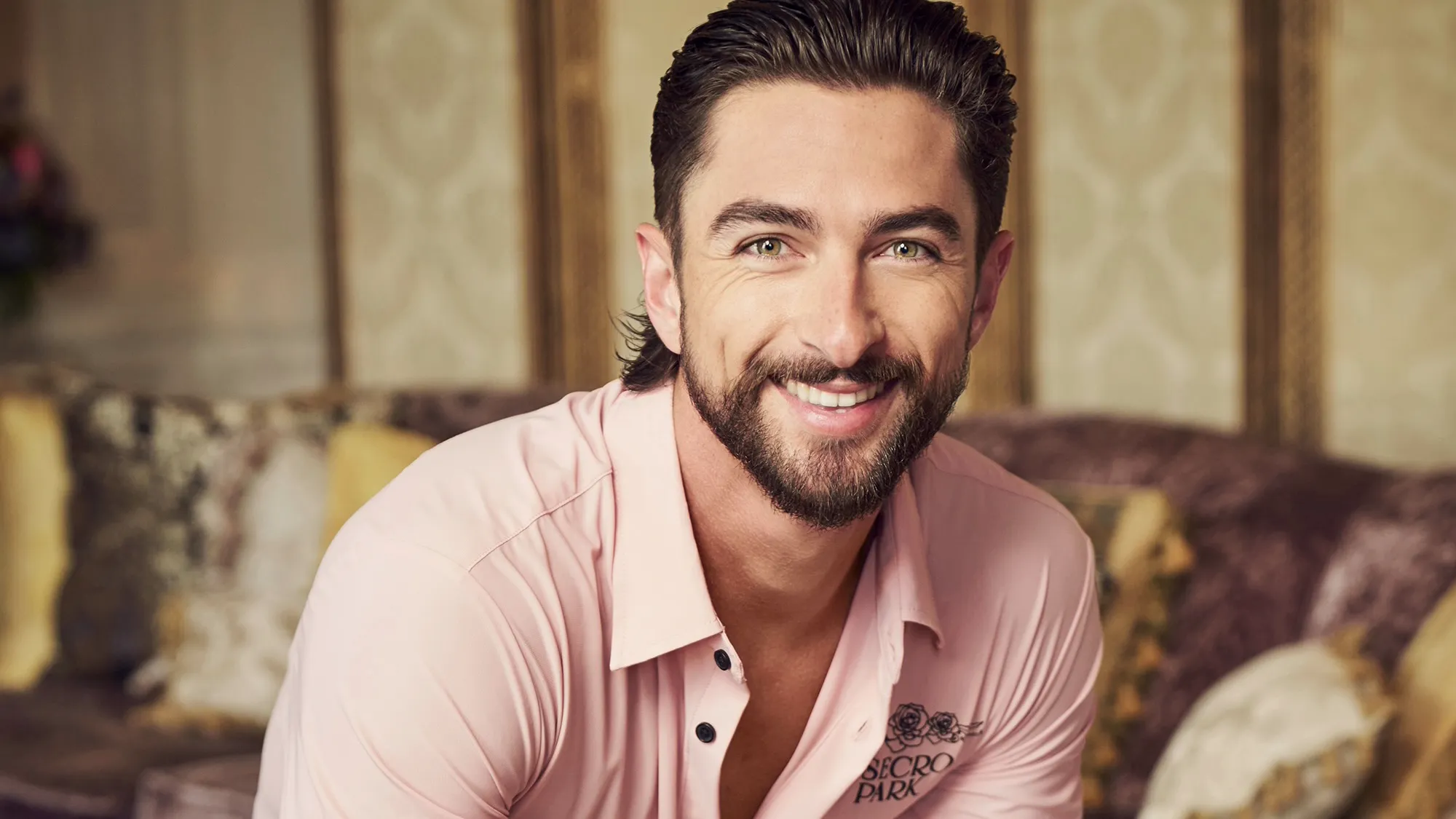 A headshot of bartender Sam for Season 3 of Vanderpump Villa.