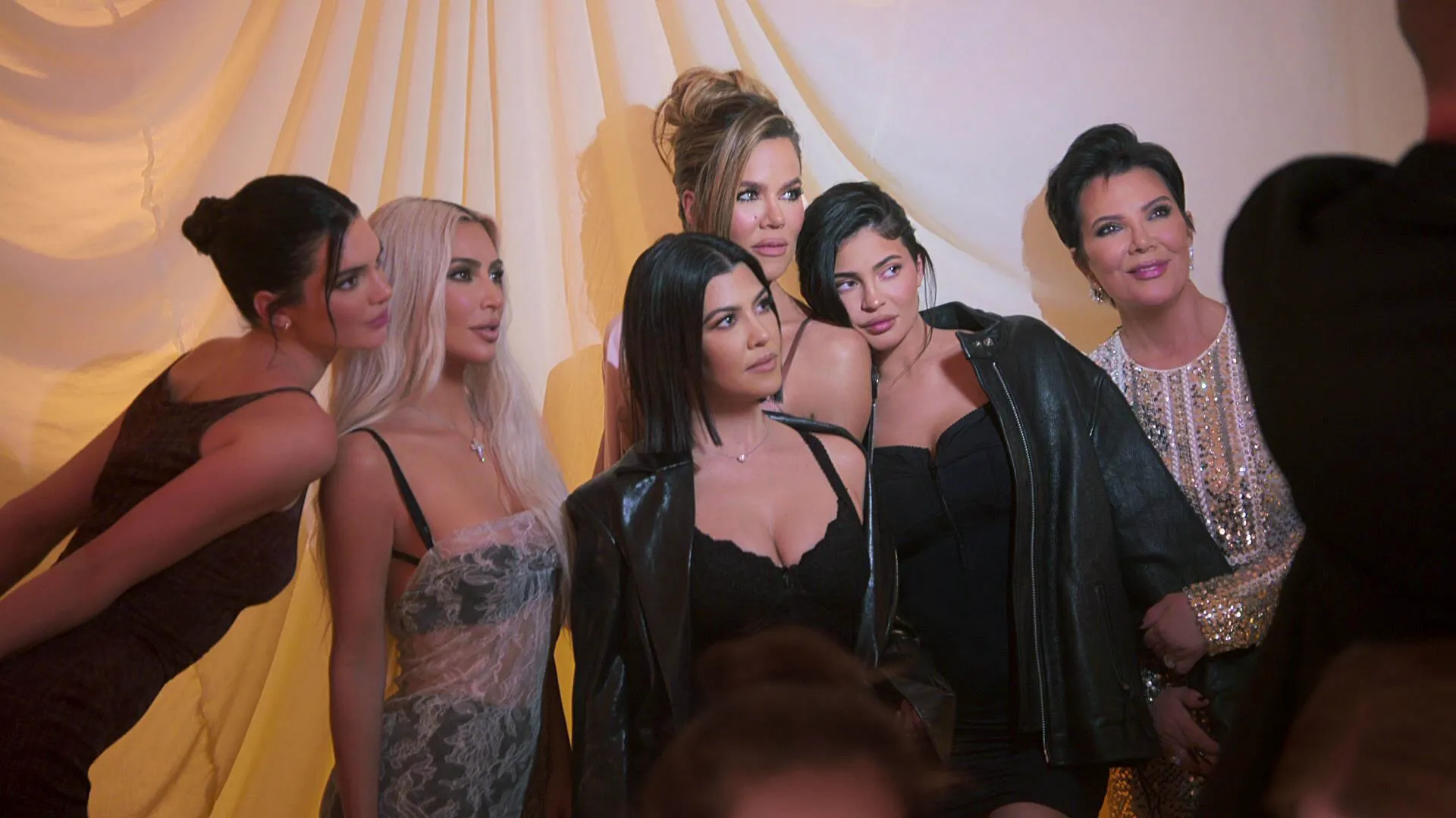 The Kardashian-Jenner family gathers for a group photo in The Kardashians.
