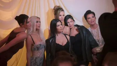The Kardashian-Jenner family gathers for a group photo in The Kardashians.