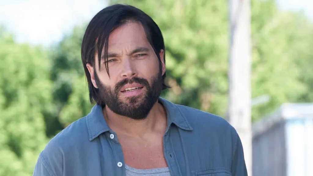 A still image of Tim Rozon as Mutt Schitt in an episode of Schitt’s Creek.