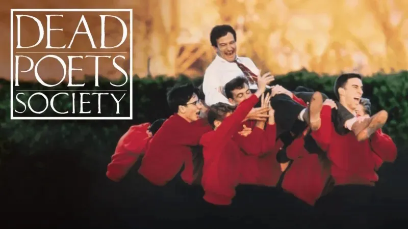 Title art for Dead Poets Society showing a group of students in red sweaters joyfully lifting their teacher in the air.