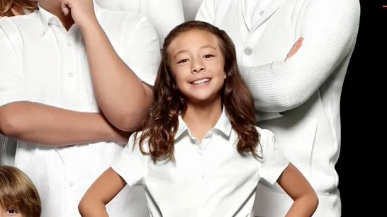 A still image of Aubrey Anderson-Emmons as Lily Tucker-Pritchett in Modern Family.