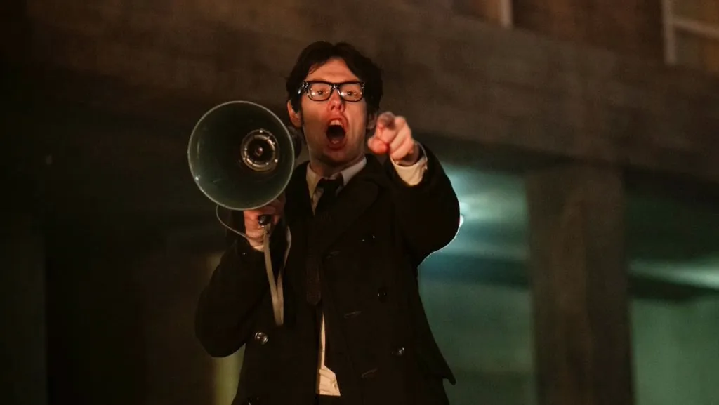 A still image of Josh Finan as Gerry Adams in the series, Say Nothing.